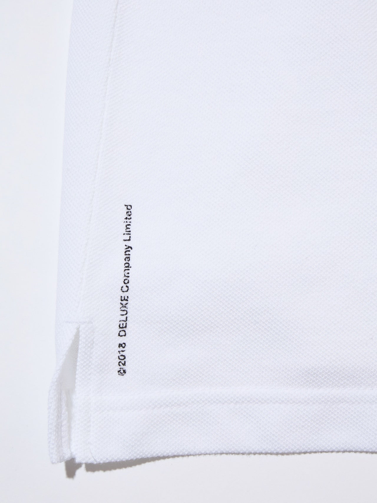 DELUXE × Wisdom Tool POLO